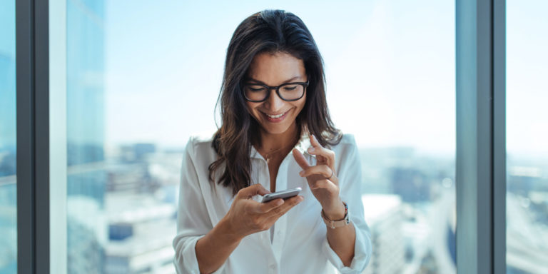 Investor looking at phone